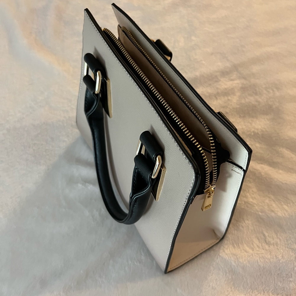 Tan and black purse